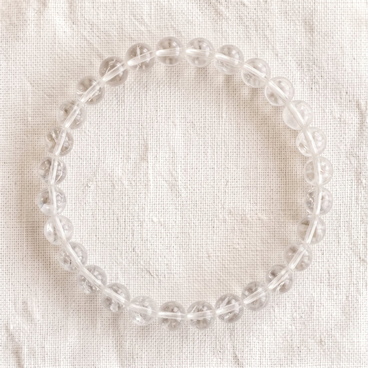 Bracelet en cristal de roche craquelé, perles de 6 mm - visuel provisoire