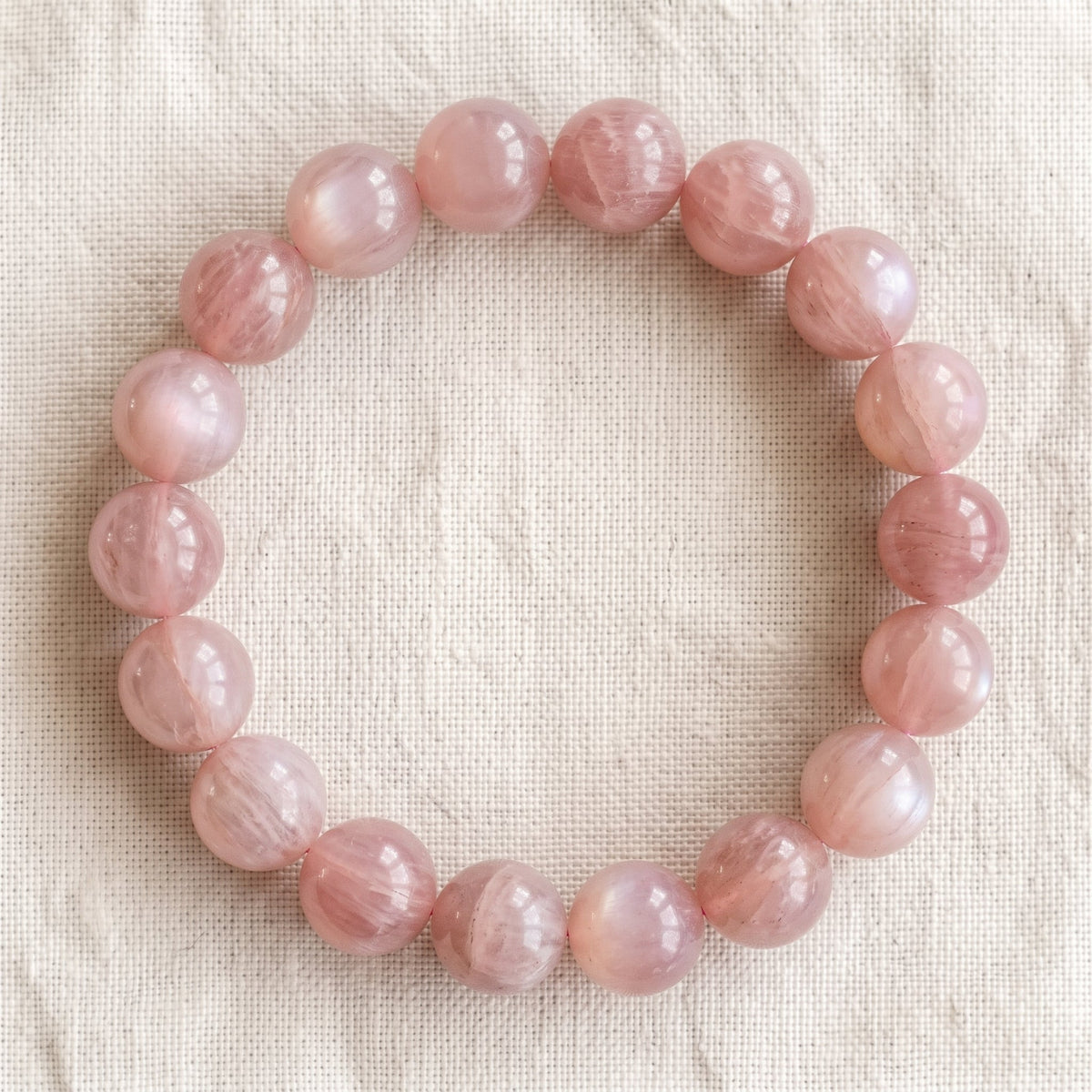 Bracelet en pierre de lune rose, perles de 10 mm - visuel provisoire