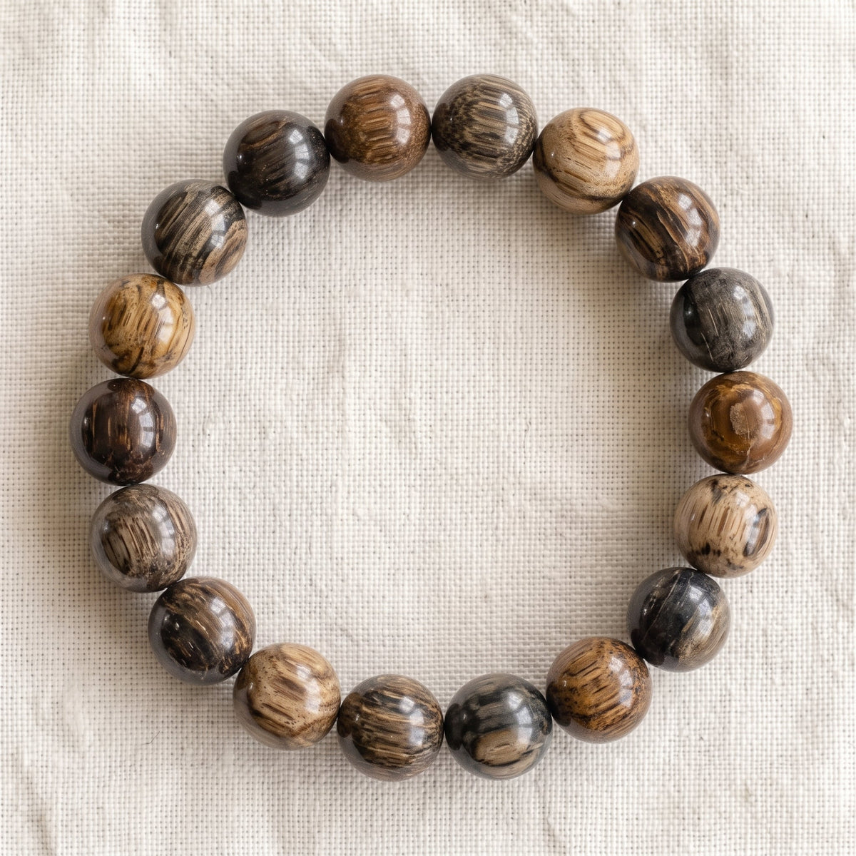 Bracelet en bois fossilisé, perles de 10 mm - visuel provisoire