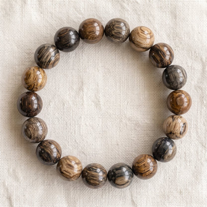 Bracelet en bois fossilisé, perles de 10 mm - visuel provisoire