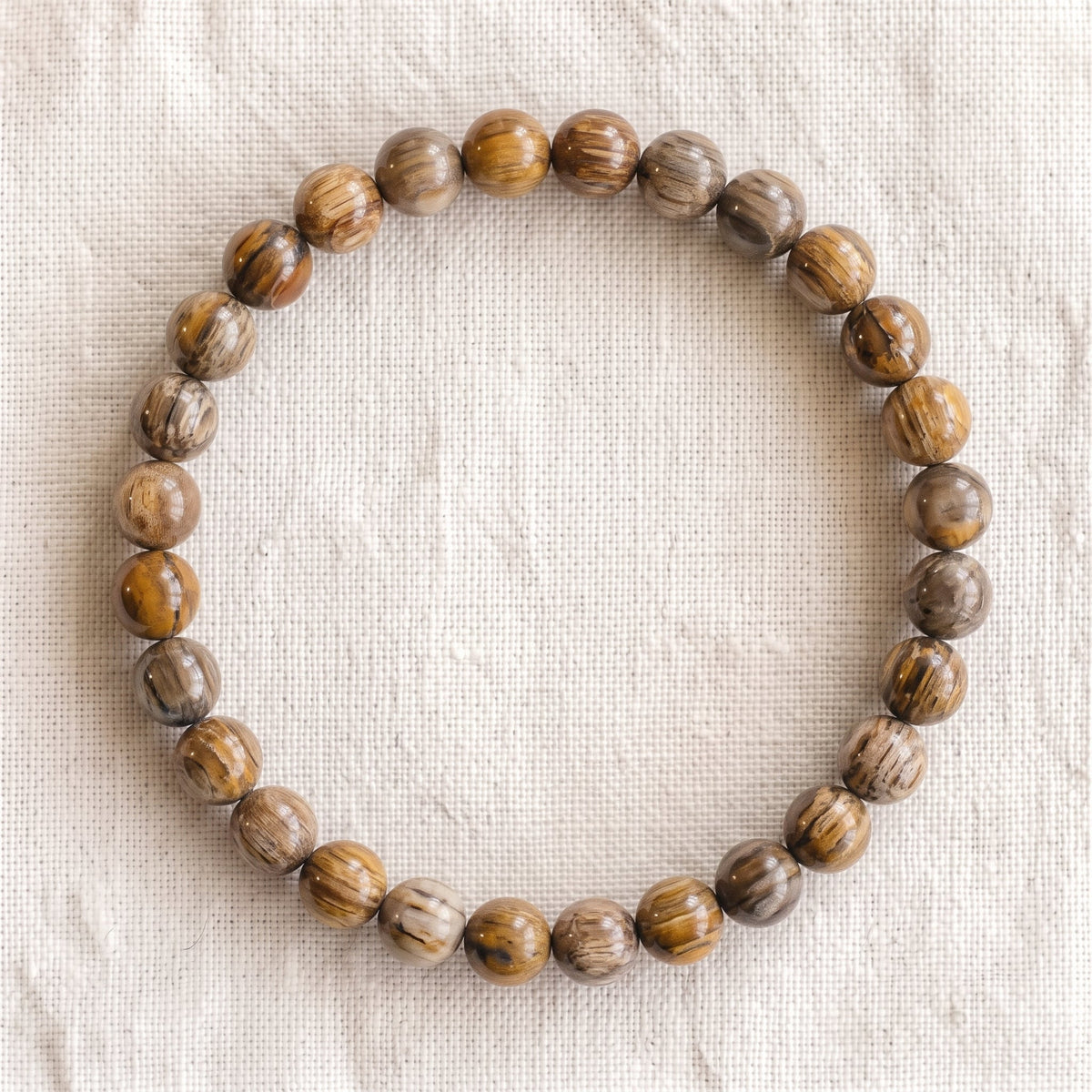 Bracelet en bois fossilisé, perles de 6 mm - visuel provisoire