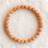 Bracelet en calcite orange, perles de 6 mm - visuel provisoire
