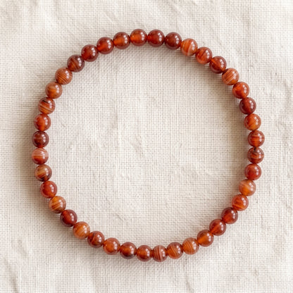 Bracelet en cornaline, perles de 4 mm - visuel provisoire