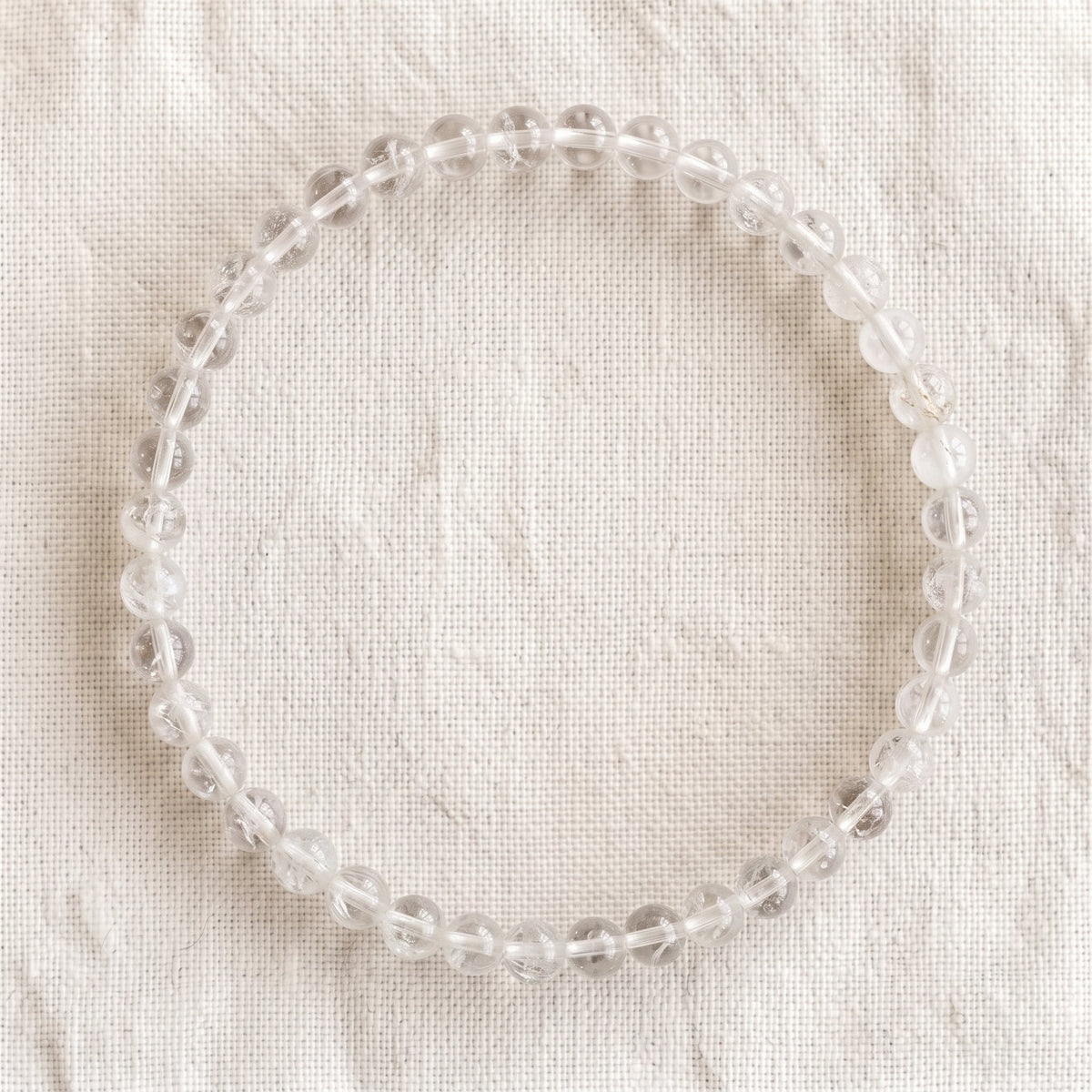 Bracelet en cristal de roche craquelé, perles de 4 mm - visuel provisoire