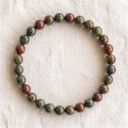 Bracelet en jaspe sang de dragon, perles de 6 mm - visuel provisoire