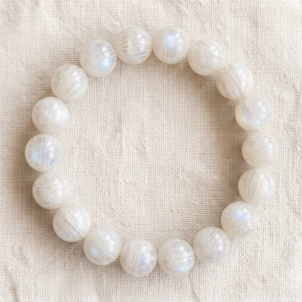 Bracelet en pierre de lune blanche, perles de 10 mm - visuel provisoire