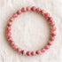 Bracelet en rhodochrosite, perles de 6 mm - visuel provisoire
